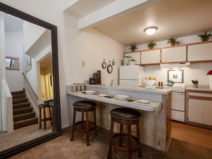 Kitchen & Dining Area (Model) at Cinnamon Tree Apartments in Albuquerque, MN